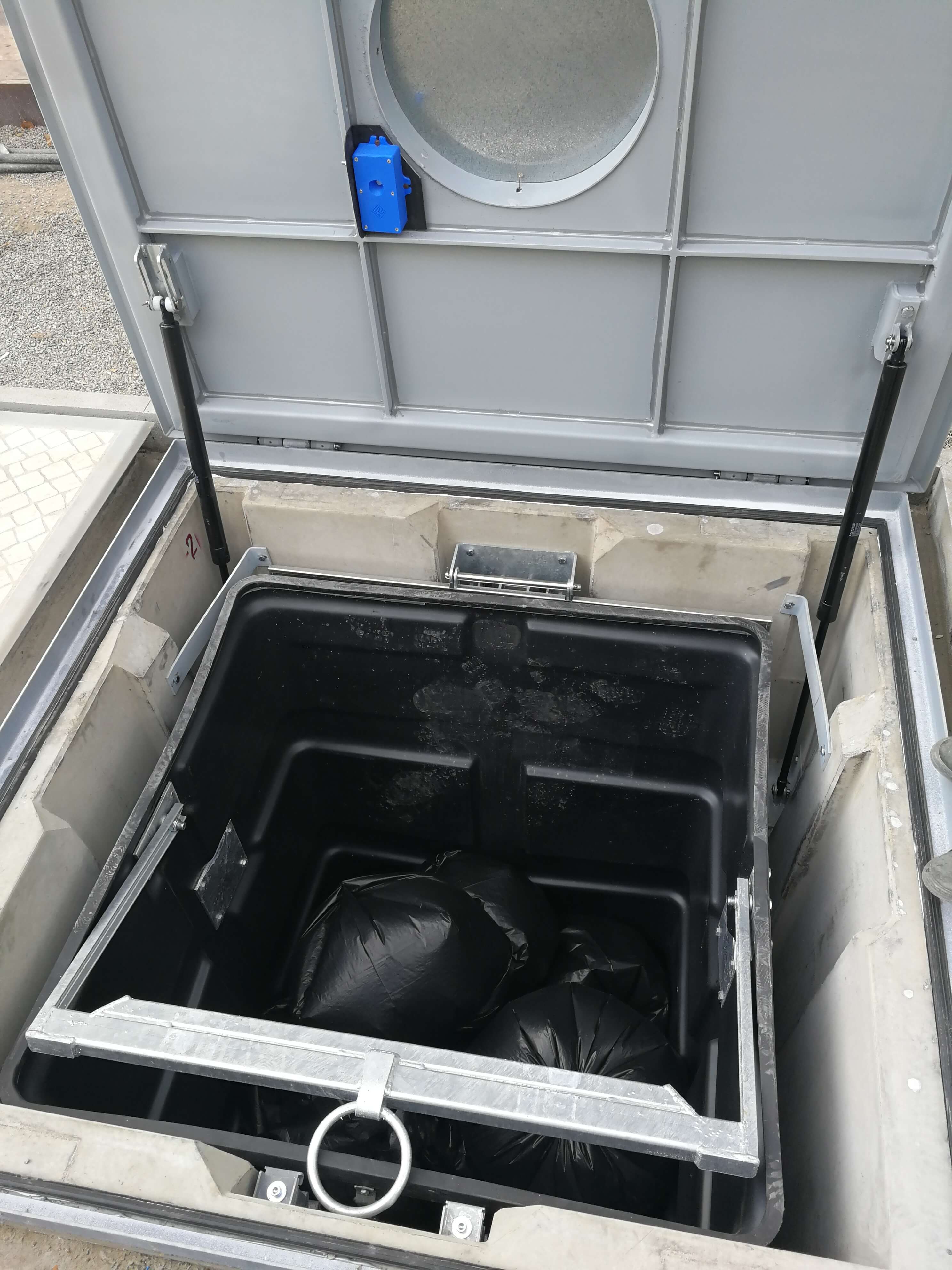 Underground garbage container with the custom-made sensor