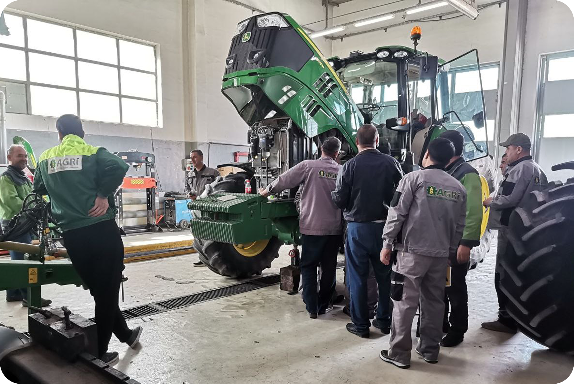 A GetGPS expert conducts an in-person master installation session on John Deere equipment in Turkmenistan